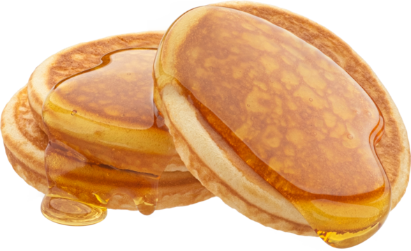 Stack of pancakes with flowing honey