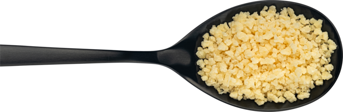 Grated parmesan cheese in spoon isolated on white background