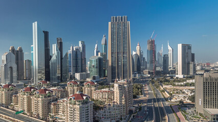 Fototapeta na wymiar Skyline view of the buildings of Sheikh Zayed Road and DIFC timelapse in Dubai, UAE.