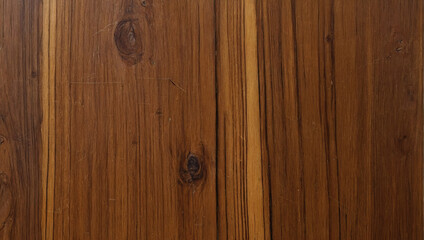 Texture of teak wood, known for its durability and rich golden-brown color, captured in a close-up photograph.