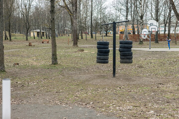 Urban sports ground with weight training and exercise equipment for sports. Sports and recreation area. Empty sports ground outdoor workout in a park.