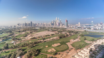 Dubai Marina skyscrapers and golf course morning timelapse, Dubai, United Arab Emirates