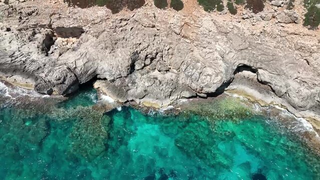 Mallorca Spain has beautiful landscape, life style, blue water, beach and rock coast, mediterranean sea, sunsets and amazing views everywhere, from the sky we can appreciate it better with a drone