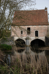 The Spui Groot Spui, former lock house on the Binnennete in Lier Belgium. Historic building landmark part of original town walls for fortification and protection of water level, popular tourist sight  - 781545197