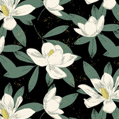 Seamless pattern of magnolia flowers and green leaves on black background