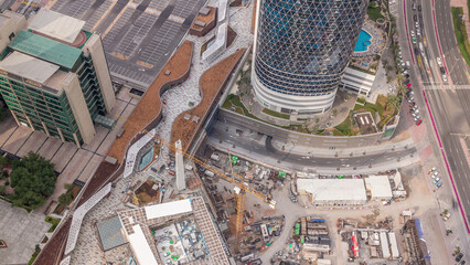 Construction of new shopping mall in Dubai city aerial timelapse, United Arab Emirates