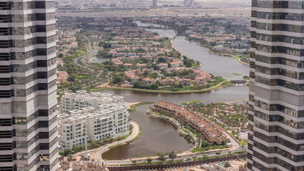 Aerial view of apartment houses and villas in Dubai city timelapse, United Arab Emirates
