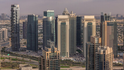 Dubai Marina skyscrapers and jumeirah lake towers view from the top aerial timelapse in the United...