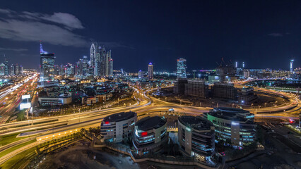 Fototapeta na wymiar Dubai Media City with Modern buildings aerial night timelapse, United Arab Emirates