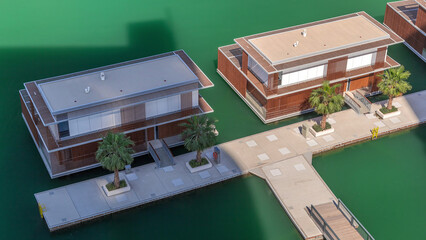 Small houses near canal in Dubai, UAE aerial timelapse