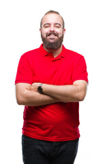 Obraz premium Young caucasian hipster man wearing red shirt over isolated background happy face smiling with crossed arms looking at the camera. Positive person.