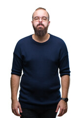 Fototapeta premium Young caucasian hipster man wearing sunglasses over isolated background puffing cheeks with funny face. Mouth inflated with air, crazy expression.