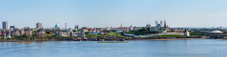 Fototapeta na wymiar Panoramic view of the Kremlin embankment of Kazan from the river.