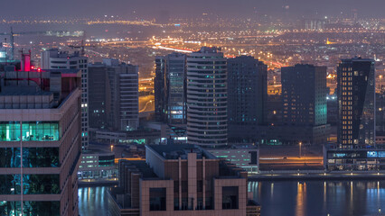 Fototapeta na wymiar Dawn in big city Dubai from night to morning transition aerial timelapse