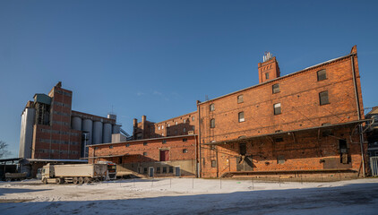 Fototapeta premium Over 150-Year-Old 19th century Abandoned Brick Grain Mill Powered by Electricity