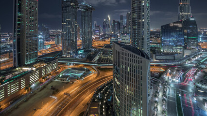 Fototapeta na wymiar Aerial night view of new skyscrapers and tall buildings Timelapse
