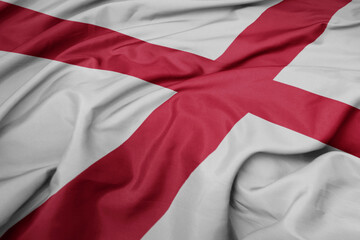 waving colorful flag of alabama state.