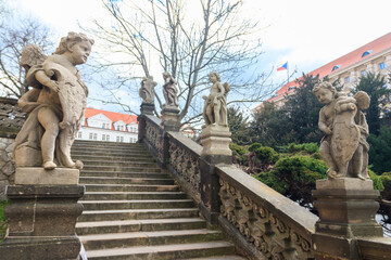 Stairway with baroque statues near Loreta Monastery in Prague, Czech Republic