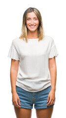 Fototapeta premium Young beautiful woman over isolated background with a happy and cool smile on face. Lucky person.