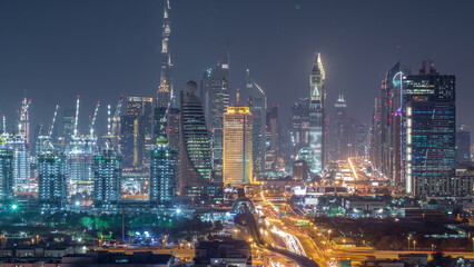 Dubai skyline with beautiful city center lights and Sheikh Zayed road traffic night timelapse, Dubai, United Arab Emirates