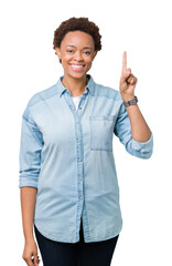 Young beautiful african american woman over isolated background showing and pointing up with finger number one while smiling confident and happy.