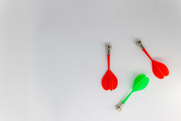 Magnetic dart arrows on white, isolated background.