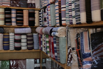 an exhibition selling cotton strips in a shop on the square in Ouagadougou Burkina Faso West Africa