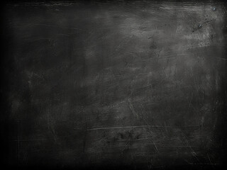 Chalkboard or blackboard presents grunge texture on aged black background