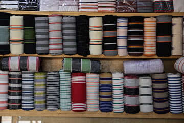 an exhibition selling cotton strips in a shop on the square in Ouagadougou Burkina Faso West Africa