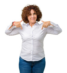 Beautiful middle ager senior businees woman over isolated background looking confident with smile...
