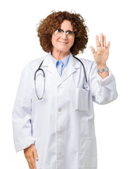 Middle ager senior doctor woman over isolated background Waiving saying hello happy and smiling, friendly welcome gesture