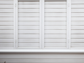A pristine white wooden shutter window for texture and background