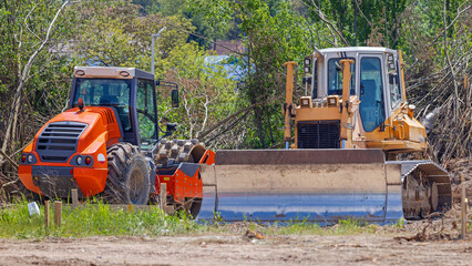 Bulldozer Earth Mover Roller Compactor Machinery at Construction Site