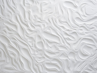 Close-up shot features the textured surface of a white wall