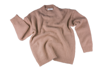 Brown flying crumpled women's autumn knitted sweater isolated on white, transparent background. Creative clothing concept, trendy cozy creasy jersey pullover. Fashion, sale, autumn discount