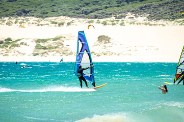 Kitesurfing on Valdevaqueros beach, Gibraltar Strait in Tarifa, Spain