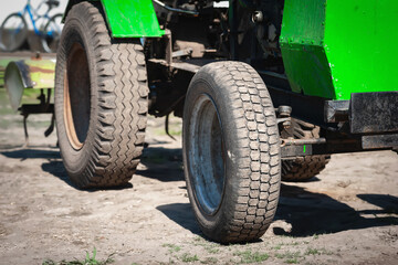 Big tires close up. Tractor wheels. Selective focus