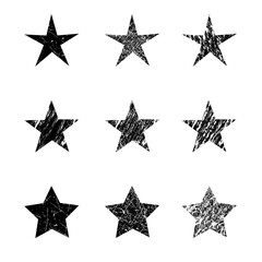Set of grunge stars - black shapes on a white background. Hand drawn vector elements with scratches and scuffs for design. Universal symbols and elements.