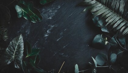 a black surface with a chalkboard design surrounded by a sea of lush green foliage and leaves - Powered by Adobe