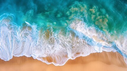 Wave crashing on sandy beach