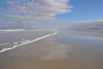 Schiermonnikoog ,The Netherlands.Island in the Waddenzee. Emptiness, dunes ,beach,clouds and sea 