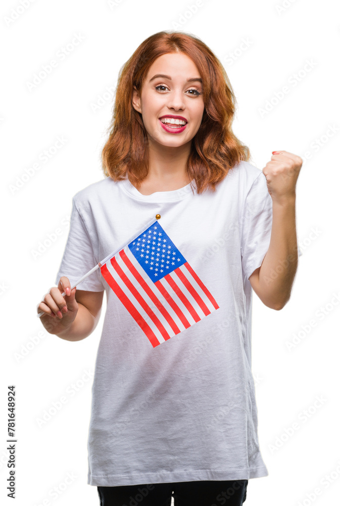 Canvas Prints young beautiful woman holding flag of america over isolated background screaming proud and celebrati