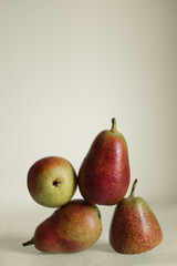A composition of pears. Still life of pears. Fresh fruits on the table
