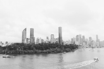 Brisbane kangaroo point lookout & river with city skyline buildings in b&w.