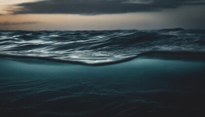blue sea or ocean water surface and underwater against sunset