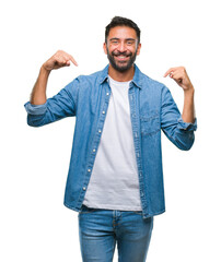 Adult hispanic man over isolated background looking confident with smile on face, pointing oneself...