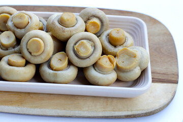 Champignon mushrooms in brine. Canned champignon mushrooms whole