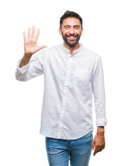 Adult hispanic man over isolated background showing and pointing up with fingers number five while...