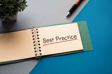 There is notebook with the word Best Practice. It is as an eye-catching image.
