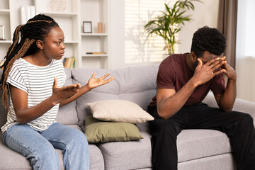 Discussion Between Couple With Tense Emotions And Conflict In Home Setting